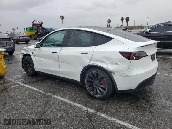 2023 Tesla Model Y Performance with VIN 7SAYGDEF1PF809654, listed as a Copart auction lot 43981915 with 16,401 mi miles and Salvage Title. Bid and sale history available at DreamBid. Image 2.