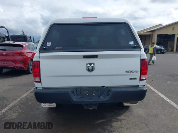 2014 Ram 1500 Tradesman with VIN 1C6RR7KG4ES323888, listed as a IAAI auction lot 41975474 with 93,779 mi miles and . Bid and sale history available at DreamBid. Image 17.