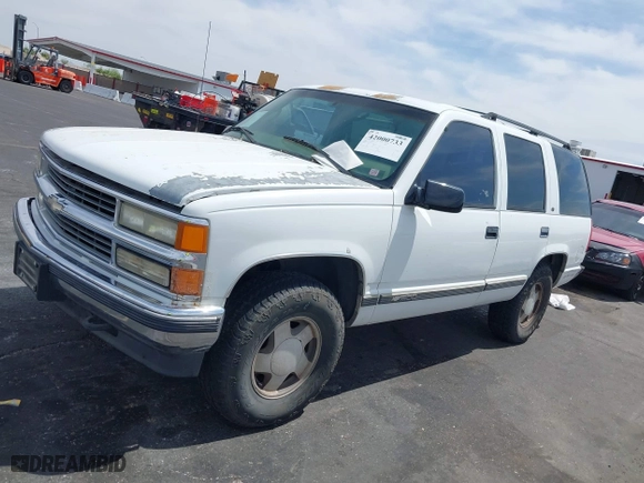 1997 Chevrolet Tahoe with VIN 1GNEK13R6VJ443195, listed as a IAAI auction lot 42000733 with 202,106 mi miles. Bid and sale history available at carsss.com. Image 12.