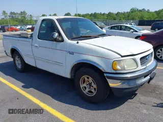 1997 Ford F-150 z VIN 1FTEF17L6VND07595, wystawiony jako IAAI lot #41958752 z przebiegiem 245 883 mil mil oraz . Historia ofert i sprzedaży dostępna na DreamBid. Obrazek 1.