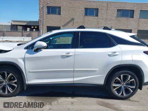 2020 Lexus RX 350 with VIN 2T2HZMDA8LC252023, listed as a IAAI auction lot 41667073 with 35,497 mi miles and . Bid and sale history available at DreamBid. Image 15.