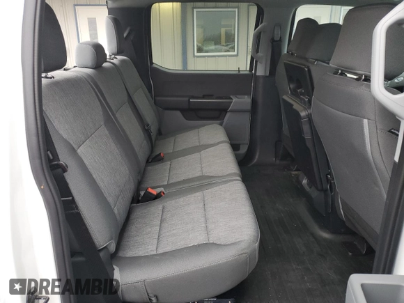 2023 Ford F-150 XL with VIN 1FTFW1E86PKG13350, listed as a Copart auction lot 87603215 with 12,534 mi miles and Salvage title. Bid and sale history available at DreamBid. Image 10.