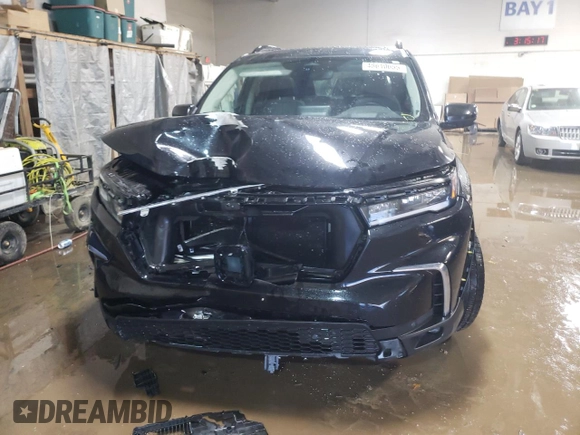 2023 Honda Pilot Elite z VIN 5FNYG1H87PB021616, wystawiony jako Copart lot #48610655 z przebiegiem 61 720 mil mil oraz Szkoda całkowita • Salvage title. Historia ofert i sprzedaży dostępna na DreamBid. Obrazek 5.