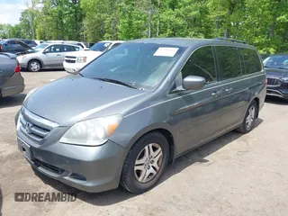 2007 Honda Odyssey EX with VIN 5FNRL38457B431016, listed as a IAAI auction lot 42155643 with 230,359 mi miles. Bid and sale history available at carsss.com. Image 2.