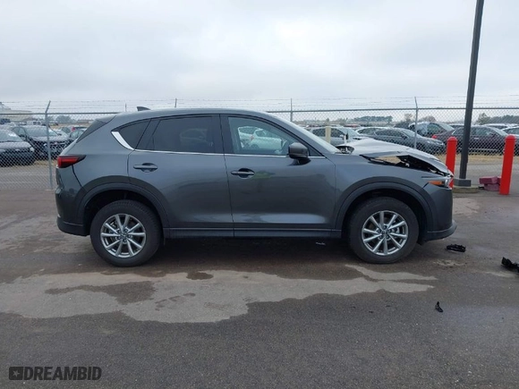 2022 Mazda CX-5 2.5 S Carbon Edition with VIN JM3KFBCM3N0594597, listed as a IAAI auction lot 40799182 with NaN miles. Bid and sale history available at carsss.com. Image 13.