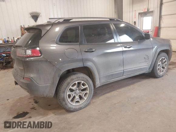 2020 Jeep Cherokee Trailhawk z VIN 1C4PJMBX8LD627104, wystawiony jako IAAI lot #41493732 z przebiegiem 46 463 mil mil oraz . Historia ofert i sprzedaży dostępna na DreamBid. Obrazek 4.