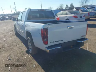 2012 GMC Canyon SLE1 with VIN 1GTD5MF91C8117334, listed as a IAAI auction lot 41221214 with 150,030 mi miles. Bid and sale history available at carsss.com. Image 3.