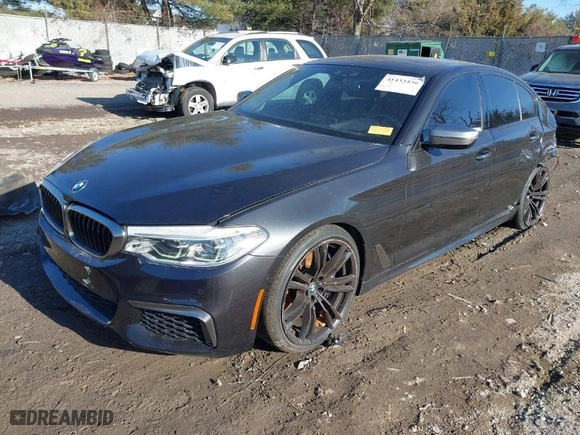 2018 BMW 5 Series M550i xDrive with VIN WBAJB9C55JB287431, listed as a IAAI auction lot 41433436 with 57,790 mi miles. Bid and sale history available at carsss.com. Image 2.