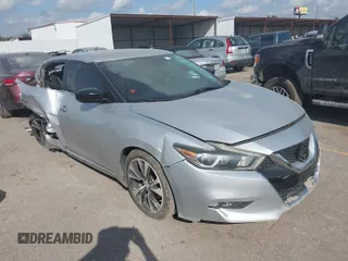 2016 Nissan Maxima SL with VIN 1N4AA6AP5GC415975, listed as a IAAI auction lot 40406438 with 141,644 mi miles and . Bid and sale history available at DreamBid. Image 1.