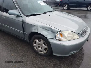1999 Honda Civic EX z VIN 1HGEJ8643XL010821, wystawiony jako IAAI lot #41602036 z przebiegiem 165 139 mil mil oraz . Historia ofert i sprzedaży dostępna na DreamBid. Obrazek 6.