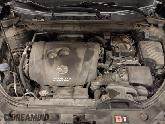 2015 Mazda CX-5 Sport with VIN JM3KE4BY0F0542655, listed as a IAAI auction lot 41471568 with 165,386 mi miles. Bid and sale history available at carsss.com. Image 10.