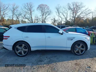 2023 Genesis GV80 z VIN KMUHCESC9PU123083, wystawiony jako IAAI lot #41166075 z przebiegiem 20 216 mil mil oraz . Historia ofert i sprzedaży dostępna na DreamBid. Obrazek 14.