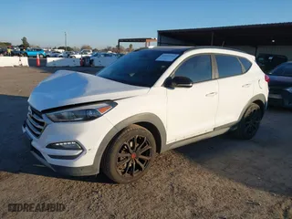 2017 Hyundai Tucson Value with VIN KM8J33A27HU541527, listed as a IAAI auction lot 41382244 with 65,848 mi miles. Bid and sale history available at carsss.com. Image 17.