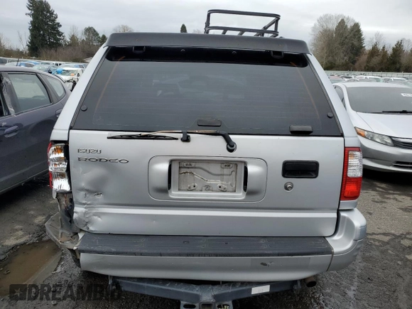 1998 Isuzu Rodeo S z VIN 4S2CK58W1W4327395, wystawiony jako Copart lot #44400715 z przebiegiem 193 659 mil mil oraz Szkoda całkowita • Salvage title. Historia ofert i sprzedaży dostępna na DreamBid. Obrazek 6.