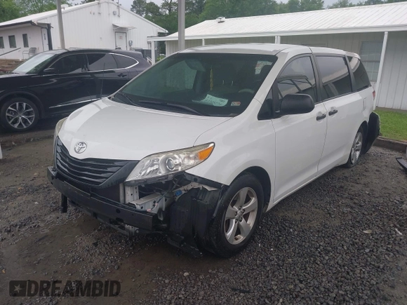 2014 Toyota Sienna L with VIN 5TDZK3DC9ES473780, listed as a IAAI auction lot 42245274 with 203,060 mi miles and . Bid and sale history available at DreamBid. Image 2.