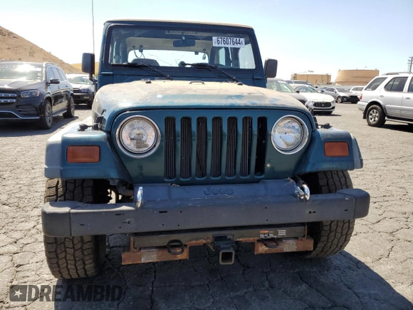 1997 Jeep Wrangler SE with VIN 1J4FY29P3VP492935, listed as a Copart auction lot 67607644 with 129,227 mi miles and Salvage Title. Bid and sale history available at carsss.com. Image 5.