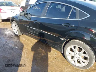 2009 Mazda 6 S Grand Touring with VIN 1YVHP82B195M23577, listed as a IAAI auction lot 41491398 with 180,512 mi miles and . Bid and sale history available at DreamBid. Image 6.