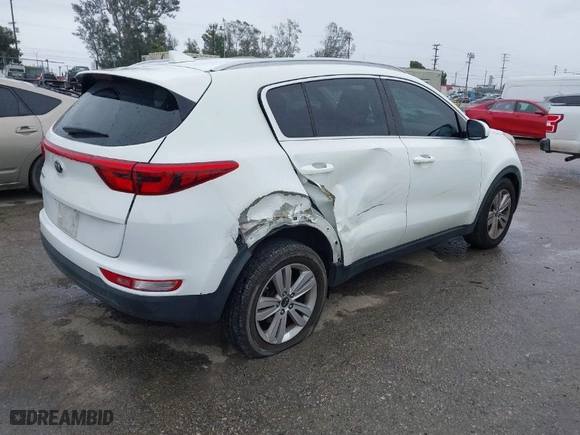 2019 Kia Sportage LX with VIN KNDPM3AC6K7508870, listed as a IAAI auction lot 41808770 with 104,141 mi miles. Bid and sale history available at carsss.com. Image 4.