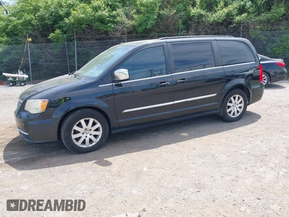 2011 Chrysler Town & Country Touring L with VIN 2A4RR8DGXBR614723, listed as a IAAI auction lot 42156531 with 116,759 mi miles and . Bid and sale history available at DreamBid. Image 2.