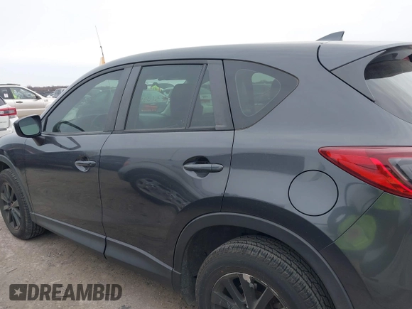 2016 Mazda CX-5 Sport with VIN JM3KE2BY4G0858100, listed as a IAAI auction lot 41368135 with 93,435 mi miles. Bid and sale history available at carsss.com. Image 14.