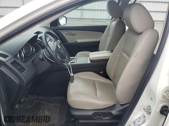 2014 Mazda CX-9 Touring with VIN JM3TB3CVXE0443089, listed as a Copart auction lot 64545195 with 121,229 mi miles and Clean title. Bid and sale history available at DreamBid. Image 7.