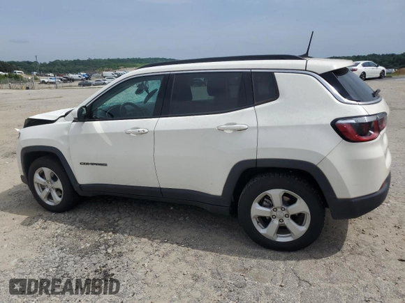 2020 Jeep Compass Latitude with VIN 3C4NJCBB3LT235180, listed as a Copart auction lot 57204295 with 74,821 mi miles and Salvage title. Bid and sale history available at DreamBid. Image 2.