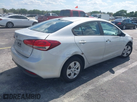 2017 Kia Forte LX with VIN 3KPFK4A75HE030220, listed as a IAAI auction lot 42004997 with 212,484 mi miles. Bid and sale history available at carsss.com. Image 4.