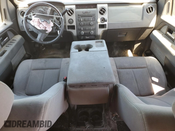 2012 Ford F-150 XL with VIN 1FTFW1EF0CFB32432, listed as a Copart auction lot 57933145 with 169,099 mi miles and Salvage title. Bid and sale history available at DreamBid. Image 8.