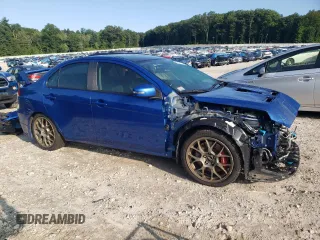 2015 Mitsubishi Lancer Evolution Final Edition z VIN JA32W7FV7FU608214, wystawiony jako Copart lot #68316174 z przebiegiem 56 714 mil mil oraz Szkody całkowita. Historia ofert i sprzedaży dostępna na DreamBid. Obrazek 4.