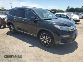 2019 Honda Pilot Elite with VIN 5FNYF6H07KB071046, listed as a Copart auction lot 57673515 with 62,835 mi miles and Salvage title. Bid and sale history available at DreamBid. Image 4.
