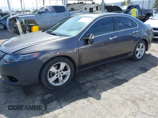 2010 Acura TSX with VIN JH4CU2F67AC038297, listed as a IAAI auction lot 41844587 with 136,741 mi miles and . Bid and sale history available at DreamBid. Image 2.