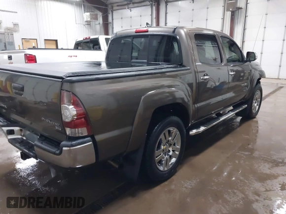 2014 Toyota Tacoma PreRunner with VIN 3TMJU4GNXEM164507, listed as a IAAI auction lot 42118984 with 183,101 mi miles and . Bid and sale history available at DreamBid. Image 4.
