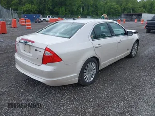 2010 Ford Fusion Hybrid with VIN 3FADP0L30AR200029, listed as a IAAI auction lot 42394846 with 192,634 mi miles and . Bid and sale history available at DreamBid. Image 4.