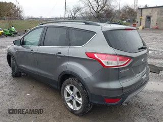 2014 Ford Escape SE with VIN 1FMCU9GX3EUB91417, listed as a IAAI auction lot 42009257 with 87,164 mi miles and . Bid and sale history available at DreamBid. Image 3.