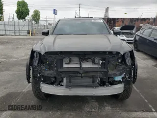 2025 Toyota Tacoma SR with VIN 3TMLB5JN4SM104263, listed as a Copart auction lot 54402775 with 1,010 mi miles and Salvage Title. Bid and sale history available at DreamBid. Image 5.