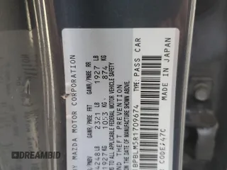 2024 Mazda 3 S Carbon Edition z VIN JM1BPBLM5R1709674, wystawiony jako Copart lot #62645125 z przebiegiem Nie podano mil oraz Nie do naprawy • Non repairable. Historia ofert i sprzedaży dostępna na DreamBid. Obrazek 13.