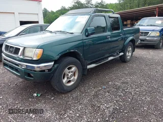 2000 Nissan Frontier XE with VIN 1N6ED27T5YC429406, listed as a IAAI auction lot 42150671 with 303,869 mi miles and . Bid and sale history available at DreamBid. Image 2.