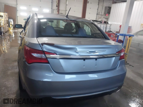 2014 Chrysler 200 Touring with VIN 1C3CCBBB0EN107711, listed as a IAAI auction lot 41576219 with 128,052 mi miles. Bid and sale history available at carsss.com. Image 16.