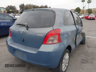 2008 Toyota Yaris with VIN JTDJT923585174474, listed as a IAAI auction lot 42025174 with 126,500 mi miles. Bid and sale history available at carsss.com. Image 4.