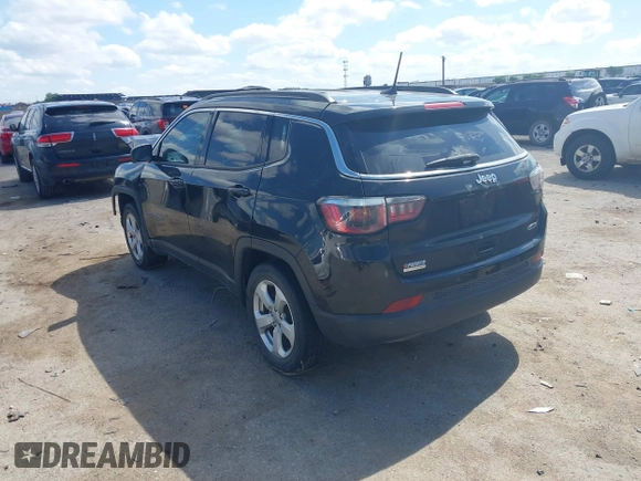 2018 Jeep Compass Altitude z VIN 3C4NJCBB0JT272524, wystawiony jako IAAI lot #42194559 z przebiegiem 125 608 mil mil oraz . Historia ofert i sprzedaży dostępna na DreamBid. Obrazek 3.