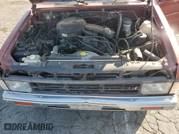 1989 Nissan Hardbody z VIN 1N6ND11S0KC342434, wystawiony jako Copart lot #71089274 z przebiegiem 300 076 mil mil oraz Szkody całkowita. Historia ofert i sprzedaży dostępna na DreamBid. Obrazek 12.