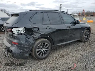 2025 BMW X5 xDrive40i with VIN 5UX23EU05S9Y99989, listed as a Copart auction lot 45664605 with 1,287 mi miles and Salvage Title. Bid and sale history available at carsss.com. Image 3.