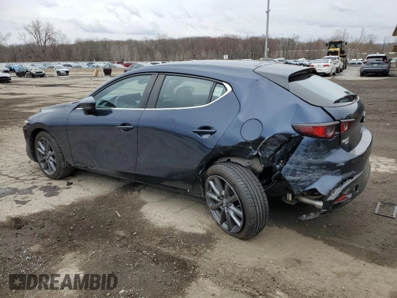 2021 Mazda 3 Preferred with VIN JM1BPBLL1M1340795, listed as a Copart auction lot 52627905 with 13,596 mi miles and Salvage title. Bid and sale history available at DreamBid. Image 2.