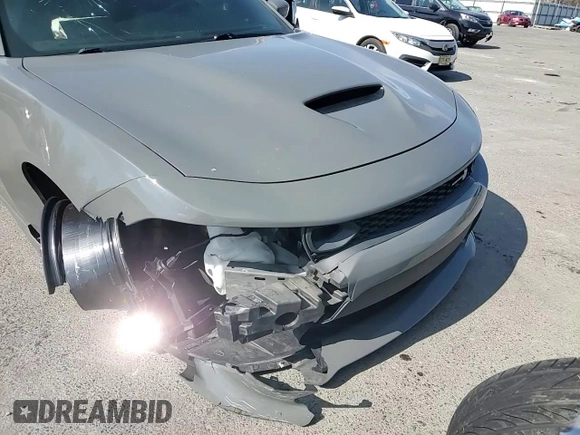 2019 Dodge Charger Scat Pack with VIN 2C3CDXGJ0KH614767, listed as a Copart auction lot 46982365 with 58,390 mi miles and Salvage title. Bid and sale history available at DreamBid. Image 11.