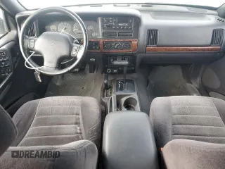 1997 Jeep Grand Cherokee Laredo with VIN 1J4GZ58Y6VC603370, listed as a Copart auction lot 82802794 with 0 mi miles and Salvage Title. Bid and sale history available at carsss.com. Image 8.