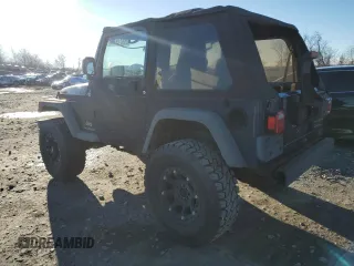 2005 Jeep Wrangler SE with VIN 1J4FA29S95P370542, listed as a Copart auction lot 85571924 with 105,465 mi miles and Salvage Title. Bid and sale history available at carsss.com. Image 2.