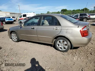2006 Kia Spectra EX z VIN KNAFE121365269433, wystawiony jako Copart lot #56634735 z przebiegiem 86 551 mil mil oraz Szkoda całkowita • Salvage title. Historia ofert i sprzedaży dostępna na DreamBid. Obrazek 2.