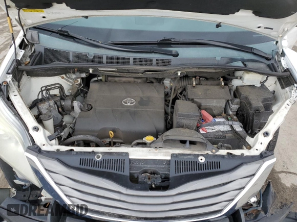 2012 Toyota Sienna XLE z VIN 5TDDK3DC6CS043440, wystawiony jako Copart lot #50408865 z przebiegiem 229 239 mil mil oraz Szkoda całkowita • Salvage title. Historia ofert i sprzedaży dostępna na DreamBid. Obrazek 14.