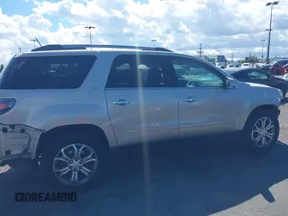 2014 GMC Acadia SLT z VIN 1GKKRSKD2EJ141913, wystawiony jako IAAI lot #41738536 z przebiegiem 100 577 mil mil oraz . Historia ofert i sprzedaży dostępna na DreamBid. Obrazek 13.
