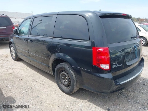 2012 Dodge Grand Caravan SE with VIN 2C4RDGBG2CR351999, listed as a IAAI auction lot 42075245 with 149,997 mi miles. Bid and sale history available at carsss.com. Image 3.